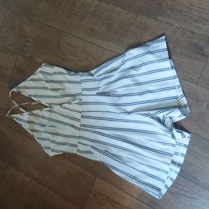 Back zip  halter style romper with adjustable straps size small